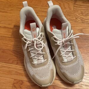 White and Tan timberland Sneakers